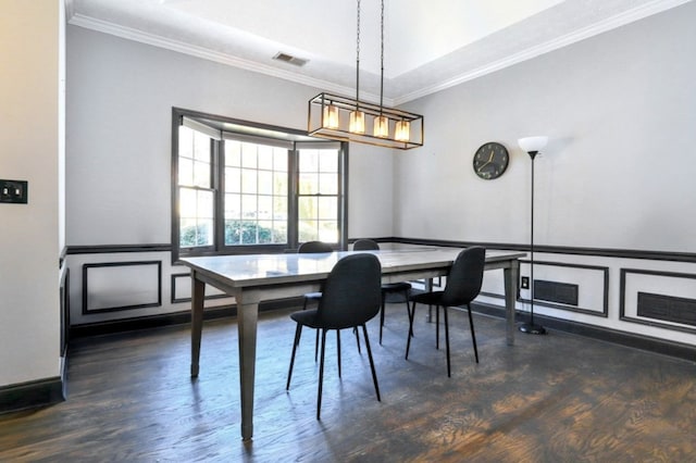 3065 NW Kings Rd, Kennesaw, GA 30144 - dining space with crown molding, wood finished floors, a decorative wall, a wainscoted wall, and a chandelier