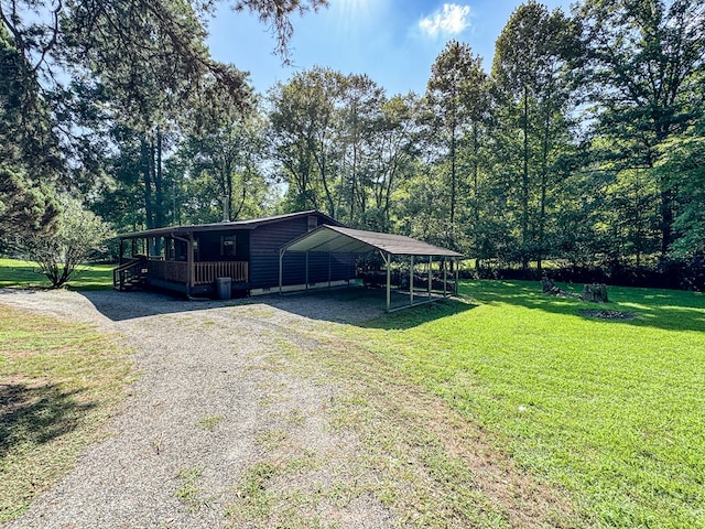 exterior space with a front yard and a carport