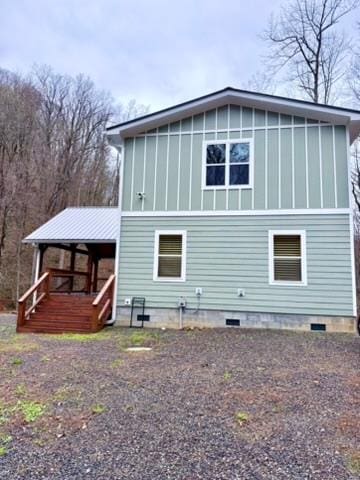 5575 Rainbow Springs Rd, Franklin, NC 28734 - rear view of property featuring a porch, crawl space, and board and batten siding