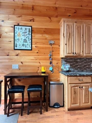 5575 Rainbow Springs Rd, Franklin, NC 28734 - bar with wooden walls, wood ceiling, light wood finished floors, and backsplash