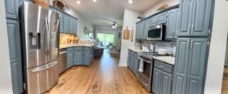 209B N Berrong St, Hiawassee, GA 30546 - kitchen featuring stainless steel appliances, light wood finished floors, light countertops, and recessed lighting