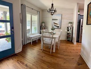 209B N Berrong St, Hiawassee, GA 30546 - dining area with a chandelier and wood finished floors