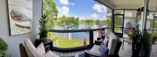 209B N Berrong St, Hiawassee, GA 30546 - sunroom / solarium with a water view