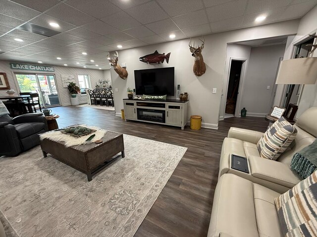 209B N Berrong St, Hiawassee, GA 30546 - living room featuring dark wood-style flooring, recessed lighting, and a drop ceiling