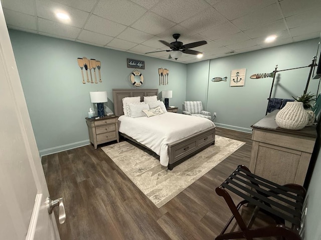 209B N Berrong St, Hiawassee, GA 30546 - bedroom featuring dark wood-style flooring, a paneled ceiling, and a ceiling fan