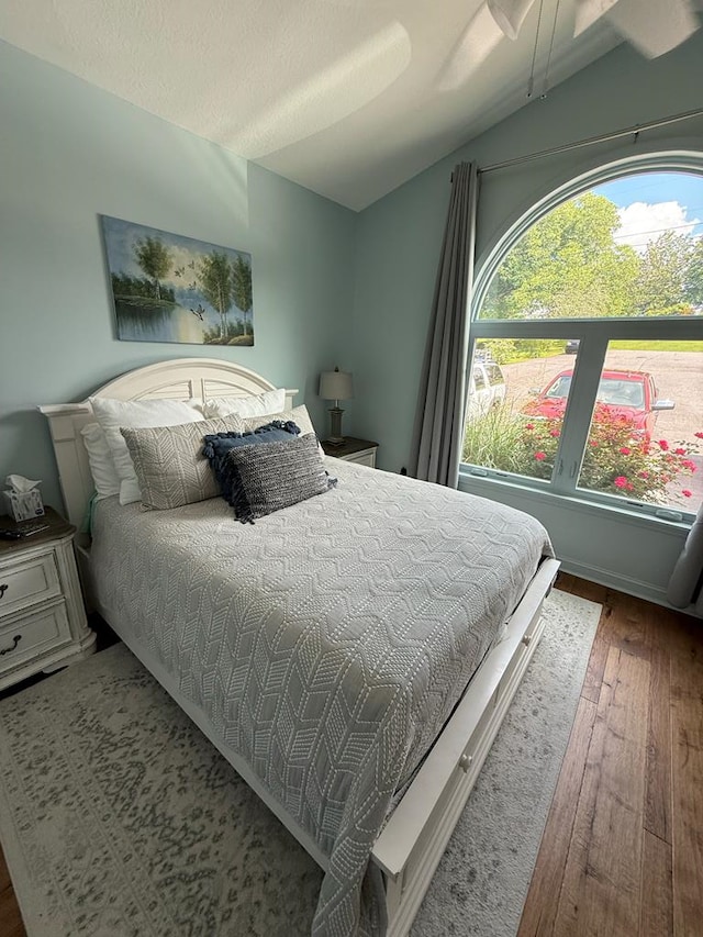 209B N Berrong St, Hiawassee, GA 30546 - bedroom with lofted ceiling and wood-type flooring