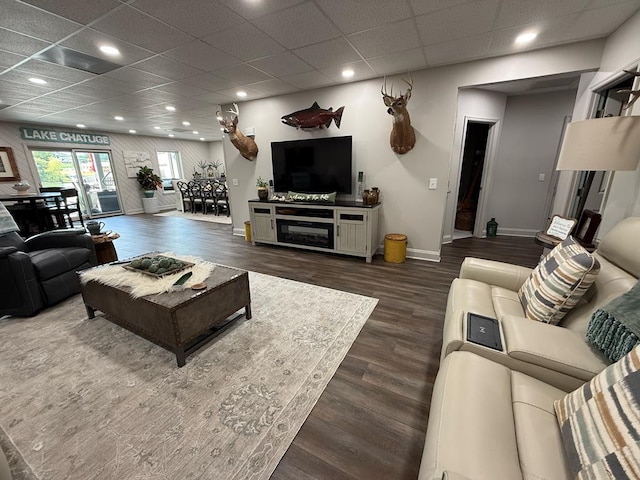 209B N Berrong St, Hiawassee, GA 30546 - living room featuring dark wood-style flooring, recessed lighting, and a drop ceiling