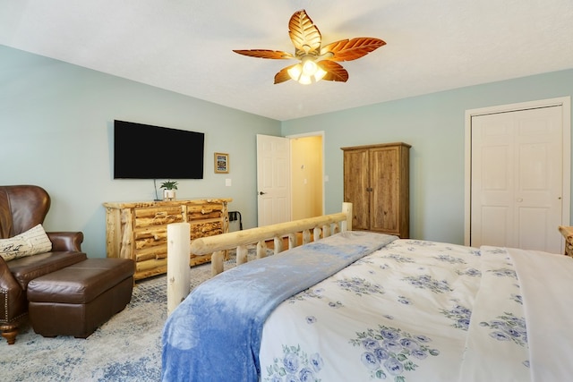 bedroom featuring a textured ceiling, a closet, and ceiling fan