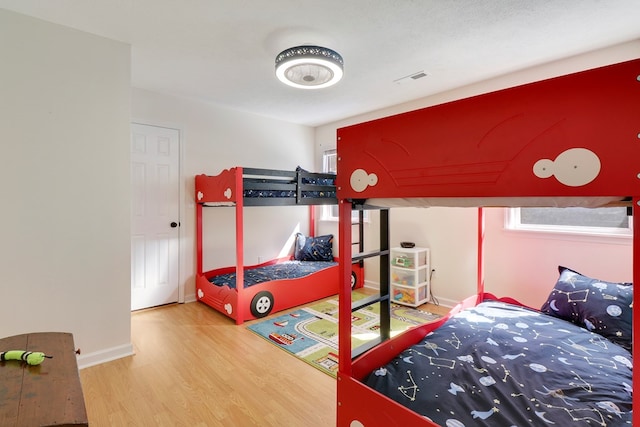 bedroom featuring wood-type flooring