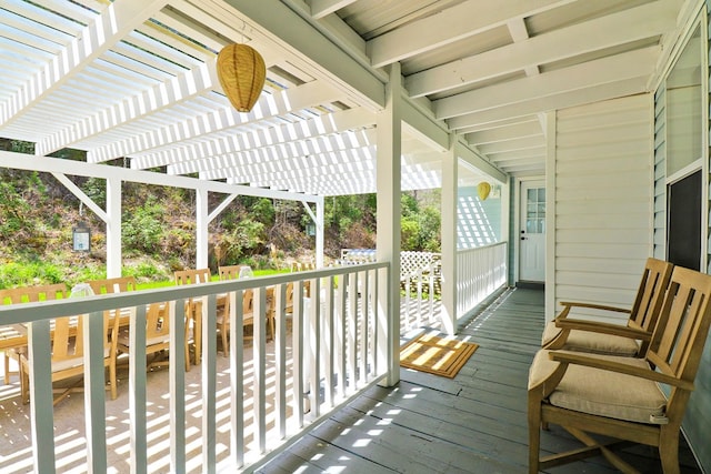 wooden deck with a pergola