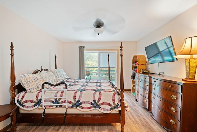 bedroom featuring light wood-type flooring and ceiling fan