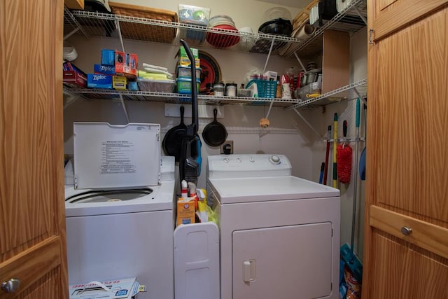 washroom featuring independent washer and dryer