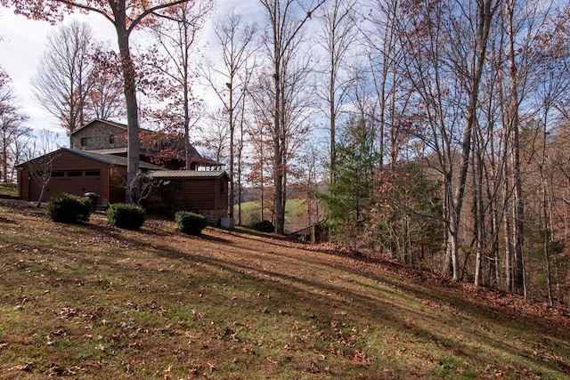 view of yard with a garage