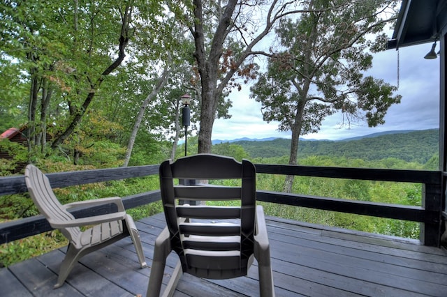 wooden terrace with a mountain view