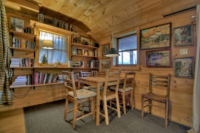 home office with hardwood / wood-style flooring, lofted ceiling, wooden walls, and wooden ceiling