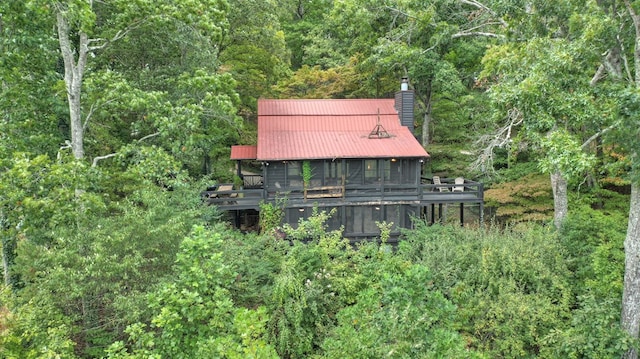 exterior space featuring a wooden deck