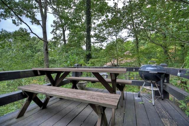 wooden terrace with area for grilling