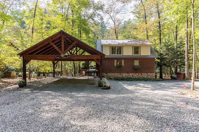 view of front facade with a carport