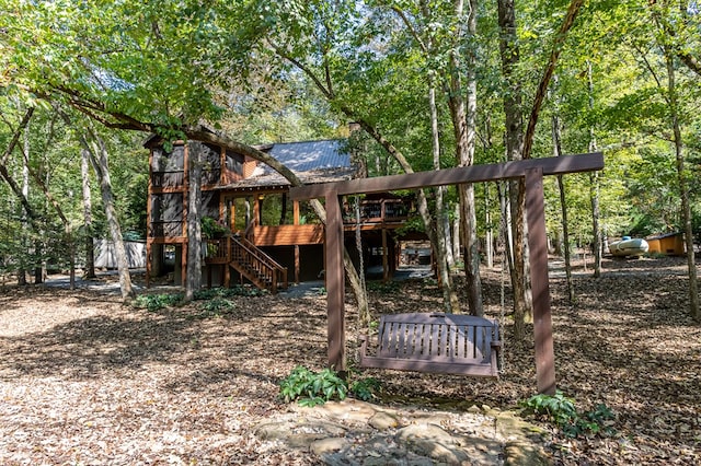 view of yard featuring a wooden deck