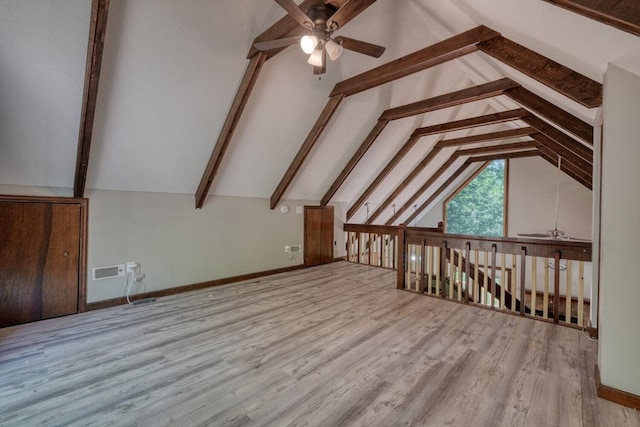additional living space featuring a ceiling fan, wood finished floors, and baseboards