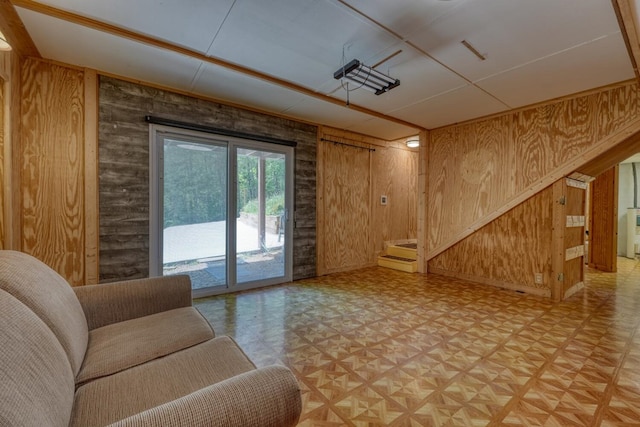 living room featuring wood walls