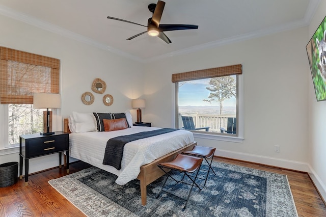 1492 Mcelroy Mountain Dr, Jasper, GA 30143 - bedroom with wood finished floors, ornamental molding, baseboards, and a ceiling fan