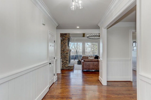 1492 Mcelroy Mountain Dr, Jasper, GA 30143 - hall featuring crown molding, a chandelier, a wainscoted wall, wood finished floors, and recessed lighting