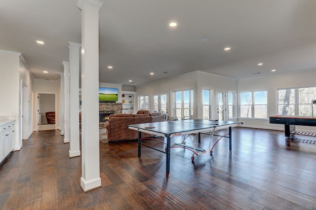 1492 Mcelroy Mountain Dr, Jasper, GA 30143 - recreation room featuring a fireplace, ornate columns, dark wood-style floors, healthy amount of natural light, and recessed lighting
