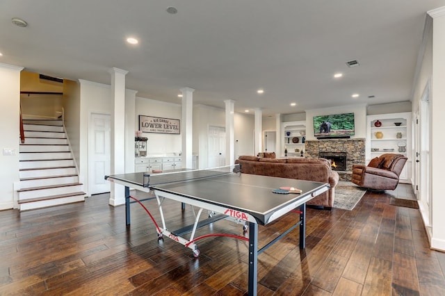 1492 Mcelroy Mountain Dr, Jasper, GA 30143 - rec room featuring dark wood-style floors, a fireplace, recessed lighting, ornate columns, and crown molding
