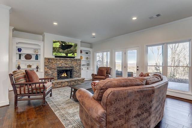 1492 Mcelroy Mountain Dr, Jasper, GA 30143 - living area featuring crown molding, dark wood finished floors, a stone fireplace, recessed lighting, and baseboards