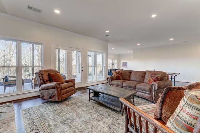 1492 Mcelroy Mountain Dr, Jasper, GA 30143 - living area with healthy amount of natural light, crown molding, recessed lighting, wood finished floors, and baseboards