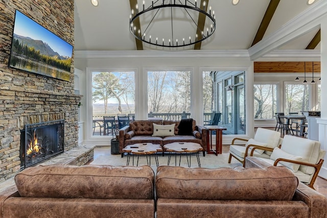 1492 Mcelroy Mountain Dr, Jasper, GA 30143 - living room with high vaulted ceiling, a fireplace, beamed ceiling, a chandelier, and wood finished floors