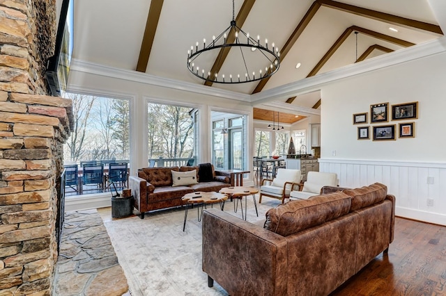 1492 Mcelroy Mountain Dr, Jasper, GA 30143 - living area featuring high vaulted ceiling, a chandelier, beamed ceiling, wood finished floors, and a wainscoted wall
