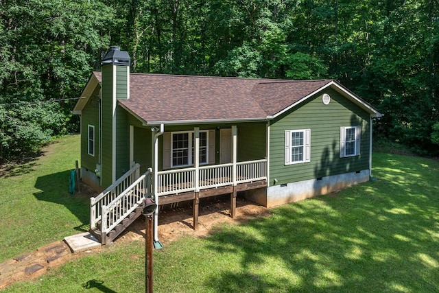 410 N Sharp Mountain Church Ln, Ball Ground, GA 30107 - view of front of home with crawl space, a porch, a front lawn, and a chimney
