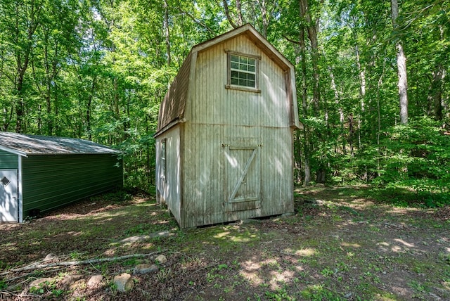 410 N Sharp Mountain Church Ln, Ball Ground, GA 30107 - view of shed featuring a wooded view