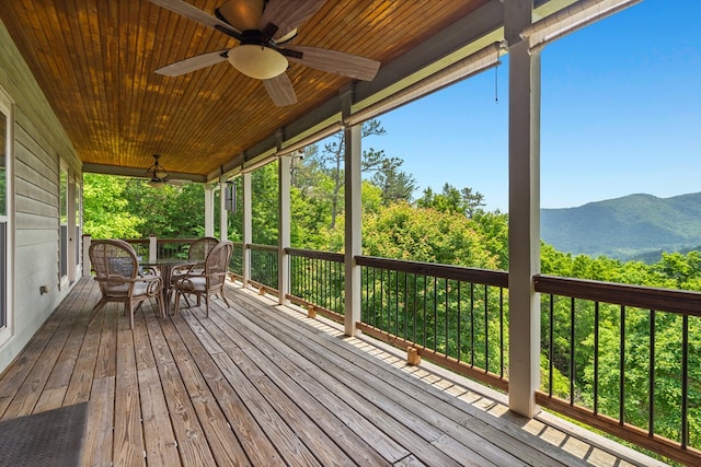 301 Shadow Mountain Rd, Dillard, GA 30537 - deck with ceiling fan, a mountain view, and outdoor dining area