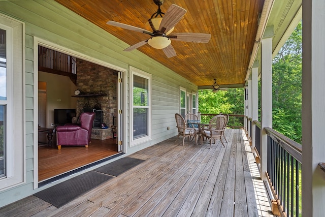 301 Shadow Mountain Rd, Dillard, GA 30537 - porch featuring ceiling fan and outdoor dining space
