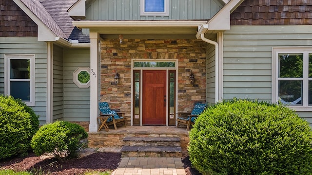 301 Shadow Mountain Rd, Dillard, GA 30537 - entrance to property with board and batten siding, a porch, stone siding, and a shingled roof