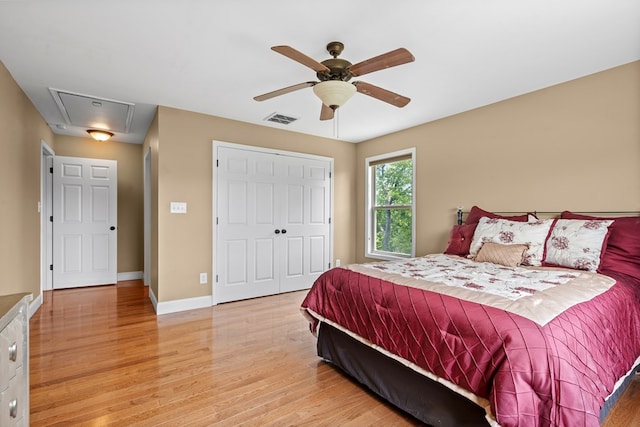 301 Shadow Mountain Rd, Dillard, GA 30537 - bedroom featuring light wood-type flooring, attic access, baseboards, a closet, and a ceiling fan