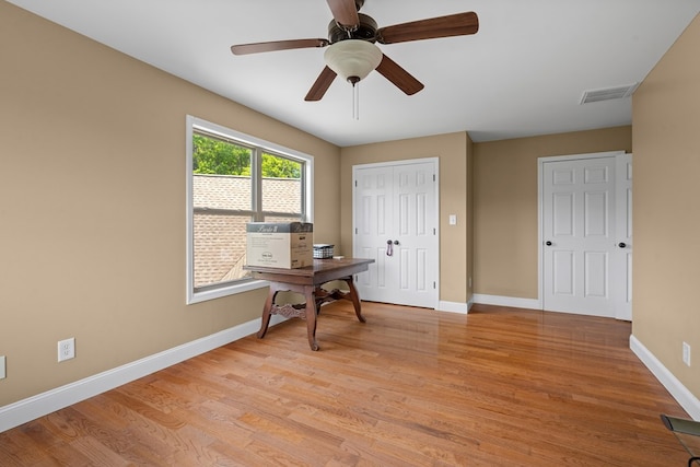 301 Shadow Mountain Rd, Dillard, GA 30537 - home office featuring baseboards, light wood finished floors, and ceiling fan