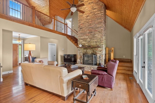 301 Shadow Mountain Rd, Dillard, GA 30537 - living room with high vaulted ceiling, stairs, wooden ceiling, a ceiling fan, and light wood-type flooring