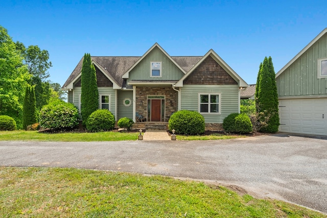 301 Shadow Mountain Rd, Dillard, GA 30537 - view of front of property featuring stone siding, board and batten siding, a garage, asphalt driveway, and a shingled roof
