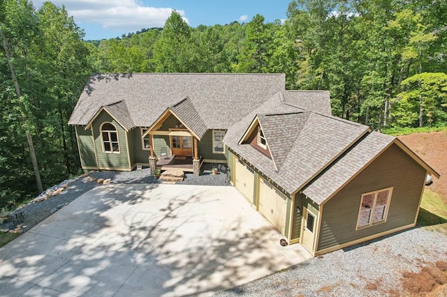 view of front of home with a garage and a porch