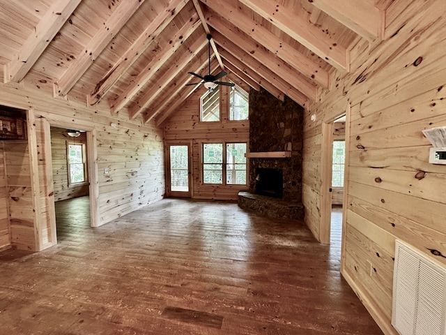 65 Christopher Dr, Ellijay, GA 30540 - unfurnished living room featuring wood walls, hardwood / wood-style flooring, a stone fireplace, wood ceiling with exposed beams, and high vaulted ceiling