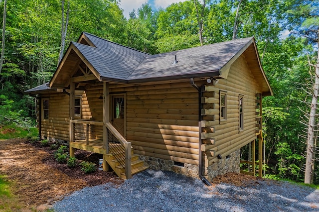 65 Christopher Dr, Ellijay, GA 30540 - view of front of house featuring a shingled roof, crawl space, and log siding
