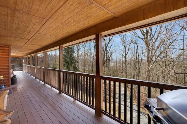 wooden terrace with grilling area