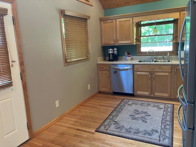 47 Starry Night Path, Murphy, NC 28906 - kitchen with stainless steel appliances, light countertops, light wood finished floors, and vaulted ceiling