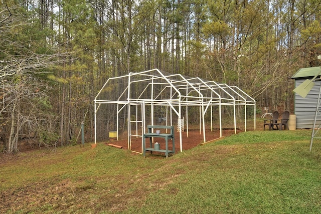 view of outdoor structure with a lawn