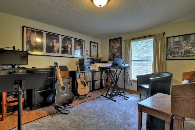 office space with a textured ceiling and hardwood / wood-style flooring