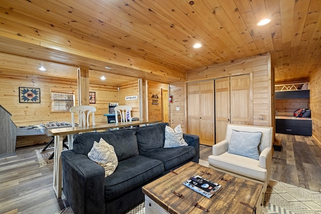 living room with wood ceiling, wooden walls, and hardwood / wood-style flooring